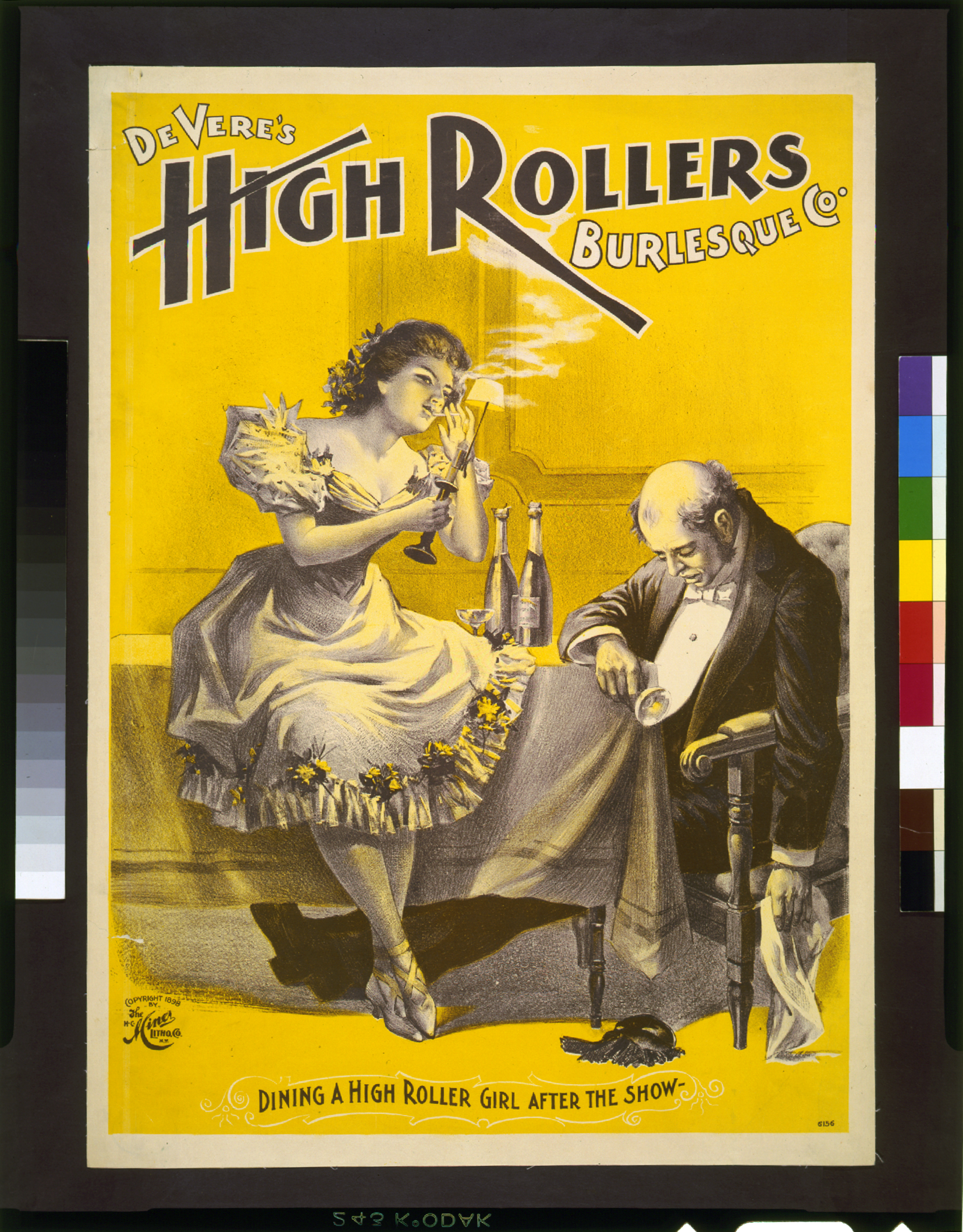 A promotional poster for the burlesque group named High Rollers Burlesque Company. Poster illustration depicts unnamed High Rollers woman member sitting on a table, lighting a cigarette off the table candle. An elderly gentleman nods off at the table holding a tipped glass of champagne, unaware that his wig has fallen onto the floor. The title at the top reads 'DeVere’s High Rollers Burlesque Co.' The caption at the bottom reads 'DINING A HIGH ROLLER GIRL AFTER THE SHOW-' The poster was received by the US Copyright Office mailroom from the H C Miner Lithography Company on June 13, 1898.
